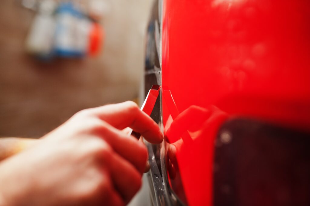 How Professional Auto Dent Repair Services Boost Your Car's Resale Value